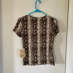 Vine and valleys snakeskin shirt with cut out hole